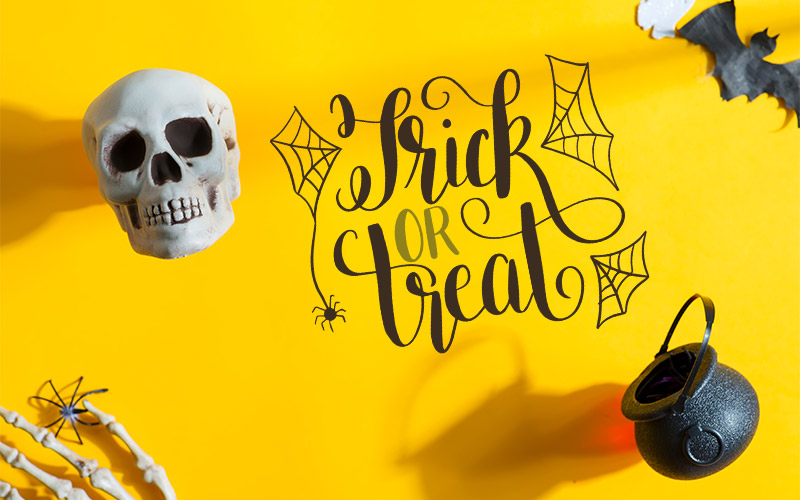Trick Or Treat- Text Overlay with a scary skull in the background