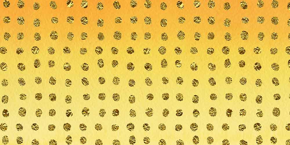 Shiny golden dots on gold background