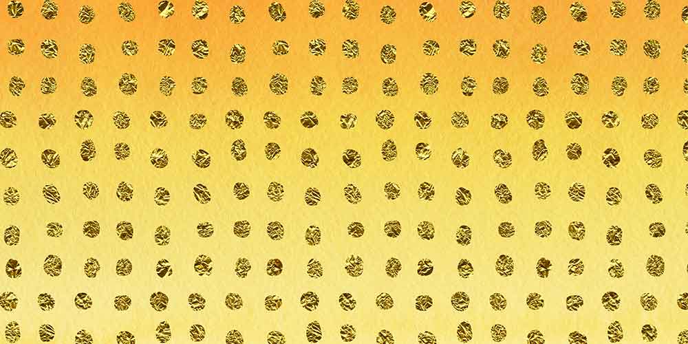 Shiny golden dots on gold background