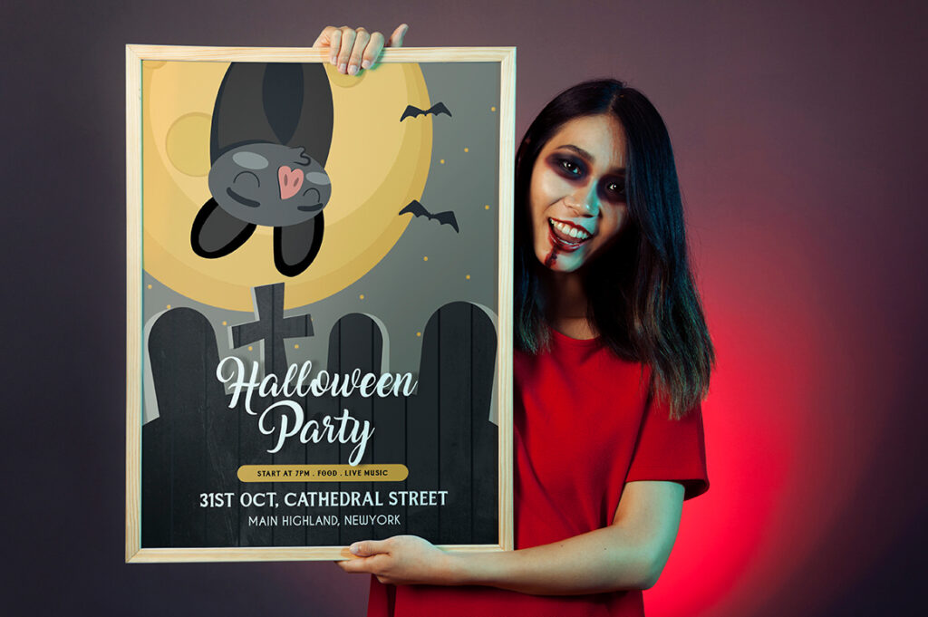Halloween Cards -A girl with a halloween themed get-up holding a Halloween Party Invitation Banner