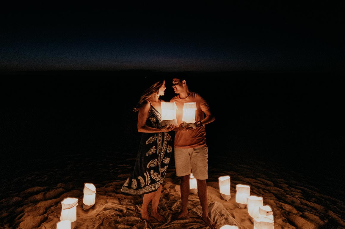 couple on beach at night
