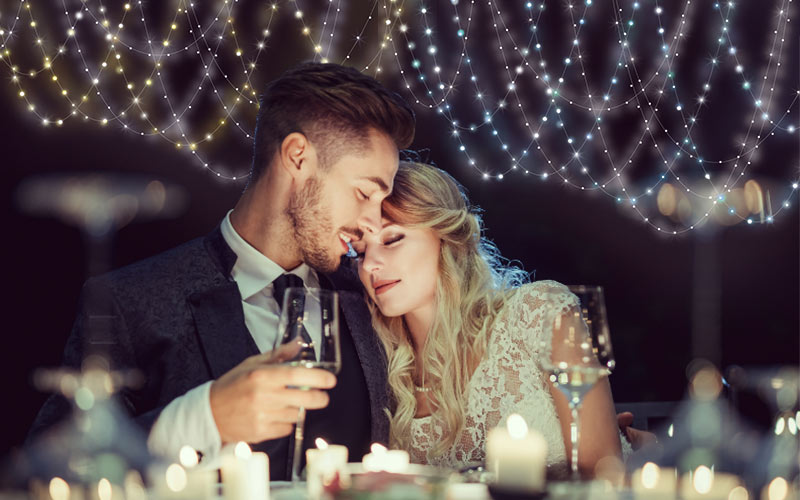 Free editing string light overlays on a picture of couple