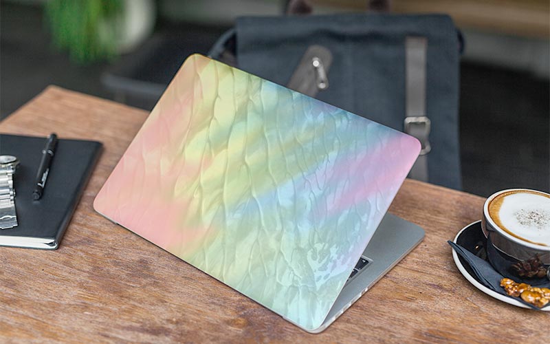 Laptop backside with multi-colored pretty backgrounds