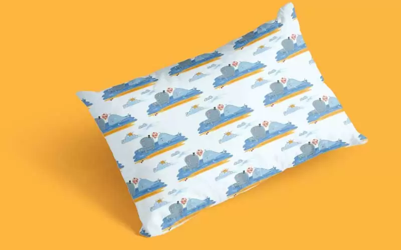 A preview of an animal pattern with fish on it used on a white pillow